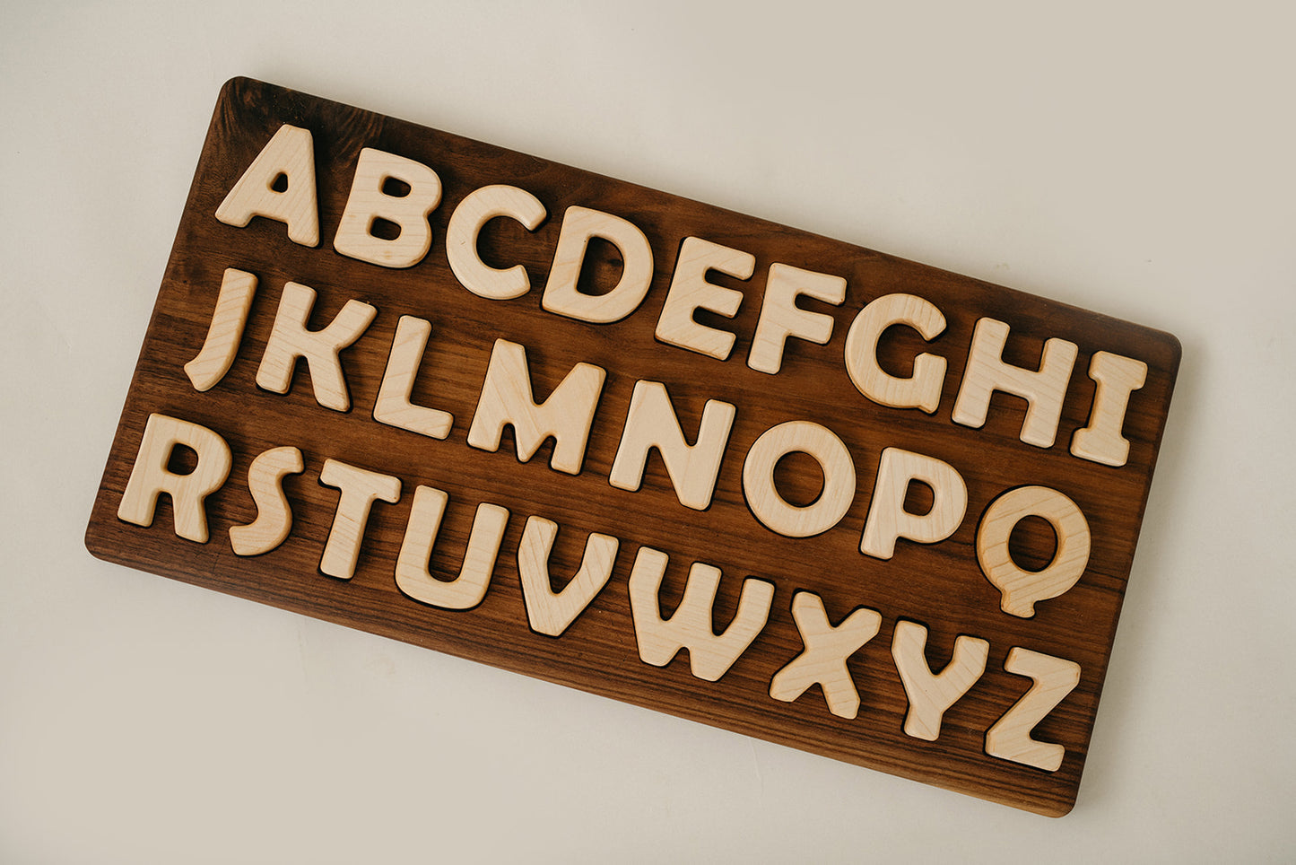wooden abc puzzle and letters
