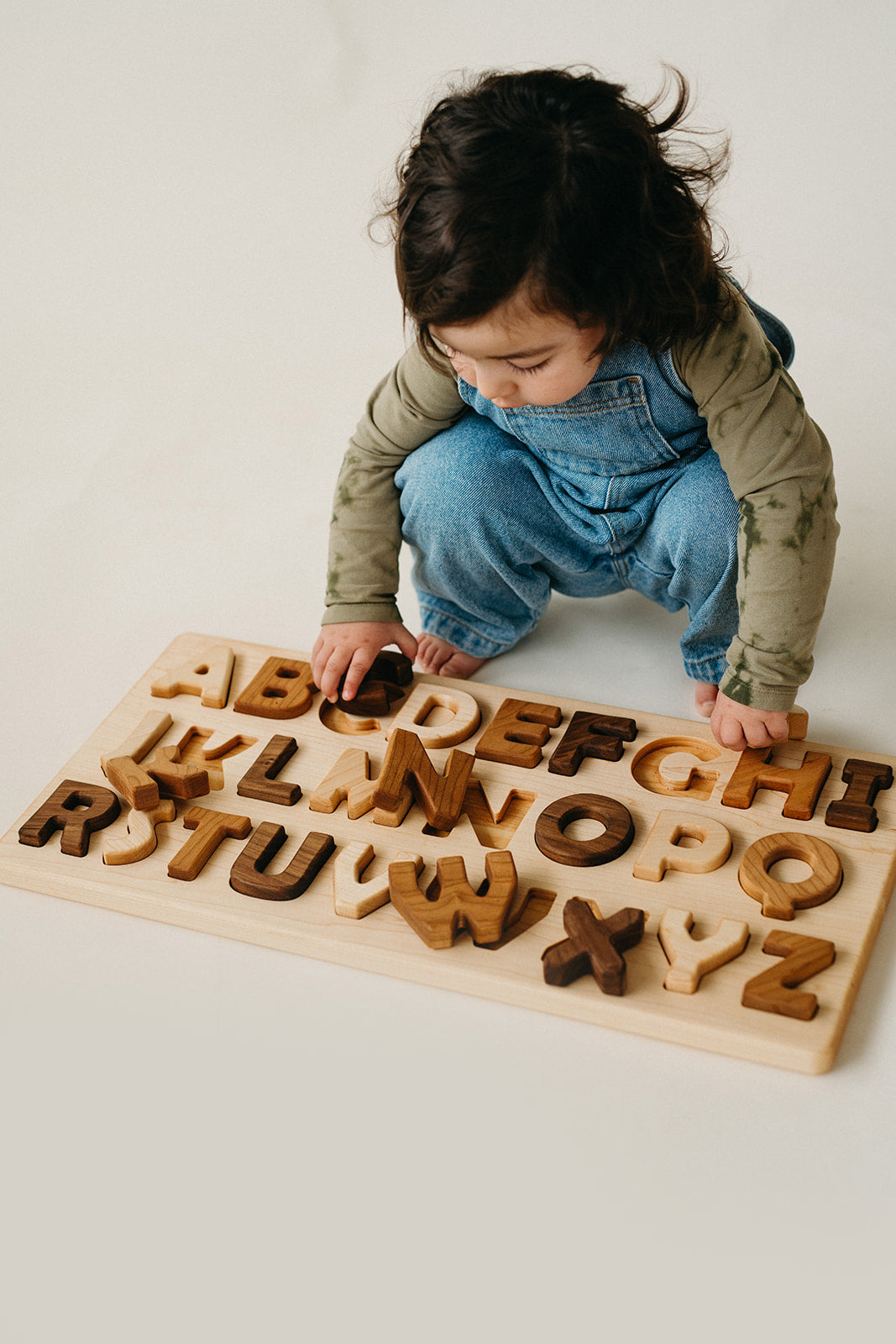wooden abc puzzle and letters