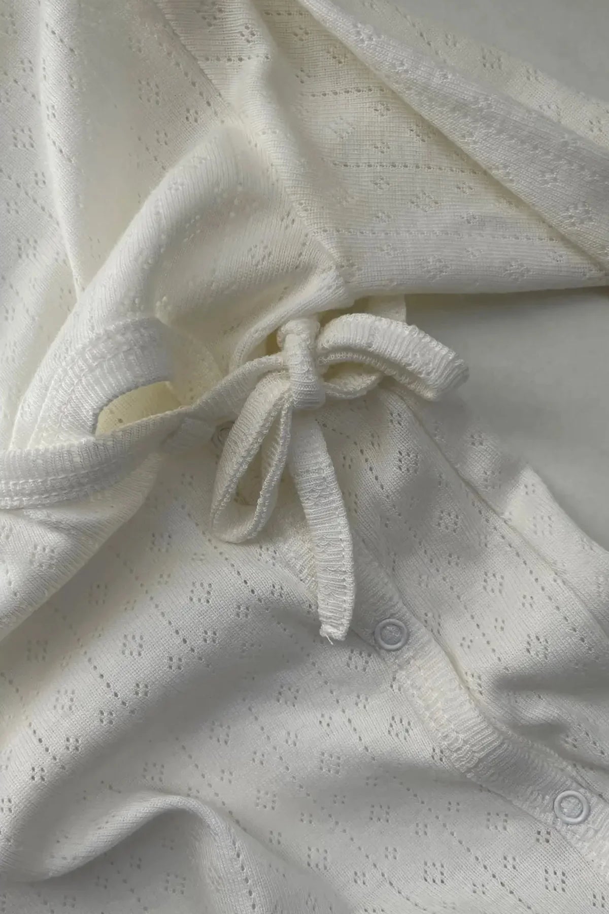 baby wrap sleepsuit- cream pointelle